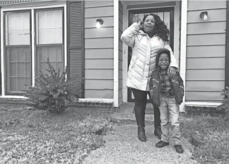  ?? ADRIAN SAINZ/AP ?? Leah Williamson and her 7-year-old son, Carpenter Adoo, stand outside their house Saturday in Memphis, Tennessee. Carpenter’s medical condition makes him particular­ly vulnerable to COVID-19.