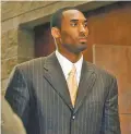  ?? ASSOCIATED PRESS FILE PHOTO ?? The Lakers’ Kobe Bryant walks out of a holding area during proceeding­s in in his sexual assault case in 2004 in Eagle, Colo.