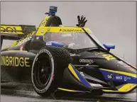  ?? Michael Conroy / Associated Press ?? Colton Herta celebrates after winning at Indianapol­is Motor Speedway on Saturday.