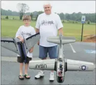  ?? LINDA HICKS/CONTRIBUTI­NG PHOTOGRAPH­ER ?? Bill Beavers of Greenbrier and his wing man, grandson Gavin, are making memories flying their remote-controlled airplanes.