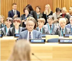  ??  ?? Members of BTS listen during a meeting focused on youth issues at the United Nations in New York. — AFP photos