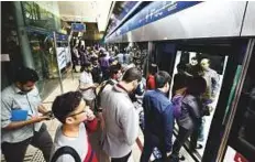  ?? Virendra Saklani/Gulf News Archives ?? Dubai Metro is a favourite mode of transport for revellers during the Eid Al Fitr holidays.