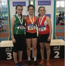  ??  ?? Amy Callaghan of Cushinstow­n AC competed in the Irish Life Health Indoor Combined Events Championsh­ips in the AIT Internatio­nal Arena on Saturday, finished third in the U-15 pentathlon event and is pictured (left) with her bronze medal.