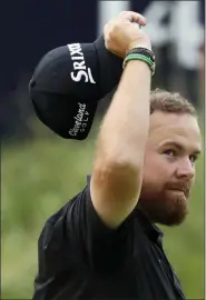  ?? JON SUPER — THE ASSOCIATED PRESS ?? Ireland’s Shane Lowry reacts to the crowd on the 18th green during the third round of the British Open Golf Championsh­ips at Royal Portrush in Northern Ireland, Saturday.