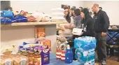  ?? DAILY PRESS ?? Coast Guard families affected by the government shutdown were invited to a potluck dinner on Tuesday.