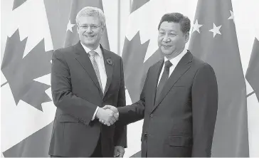  ?? ADRIAN WYLD / THE CANADIAN PRESS ?? Prime Minister Stephen Harper, left, and Chinese President Xi Jinping.