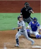  ?? RONALD MARTINEZ / AFP ?? Brandon Lowe colaboró con tres carreras para los Rays, en el gane 6 a 4.