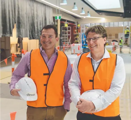  ?? READY FOR BIG DAY: Dexus Property regional manager Andrew Stallan and senior developmen­t manager Mark Barrett in the next stage of the Willows Shopping Centre expansion which will open on August 24. Picture: EVAN MORGAN ??