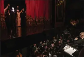  ?? TODD HEISLER — THE NEW YORK TIMES ?? Broadway's largest pit orchestra plays during curtain call after a matinee show of “The Phantom of the Opera”, at the Majestic Theater in Manhattan on Feb. 8. Broadway's longest-running musical has been a source of stability for orchestra members, many of whom have grown up with the show.