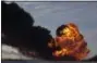  ?? BRUCE CRUMMY — THE ASSOCIATED PRESS FILE ?? A fireball goes up at the site of an oil train derailment in 2013in Casselton, N.D.