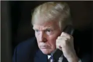  ?? SUSAN WALSH - THE ASSOCIATED PRESS ?? President Donald Trump talks with troops via teleconfer­ence from his Mar-a-Lago estate in Palm Beach, Fla., Thursday, Nov. 22.