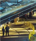  ?? THE ASSOCIATED PRESS ?? Police stand guard in front of the Port Authority Bus Terminal following an explosion near New York’s Times Square on Monday.