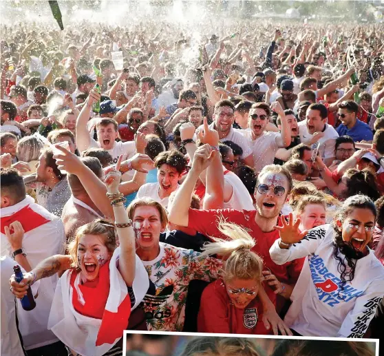  ??  ?? Joy: Fans celebrate that early goal in a fountain of beer spray as they watch on a giant screen in Hyde Park