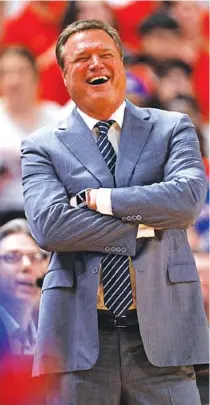  ?? AP PHOTO/BRAD TOLLEFSON ?? Kansas men’s basketball coach Bill Self laughs during a road game against Texas Tech on March 7.