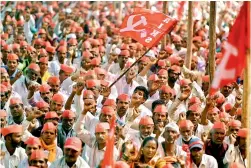  ?? PTI ?? Farmers take part in Kisan long march organised by All Indian Kisan Sabha at Azad Maidan in Mumbai on Monday. —