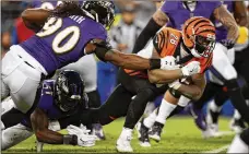  ?? PATRICK SMITH / GETTY IMAGES ?? Running back Joe Mixon overcame injuries to post a strong finish, but the Bengals still wrapped up the season as the No. 31 rushing offense in the NFL.