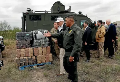  ?? AP ?? President Donald Trump tours the US border with Mexico at the Rio Grande on the southern border yesterday in McAllen, Texas.
