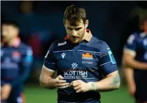  ?? ?? Mark Bennett is dejected after a disappoint­ing performanc­e against Glasgow