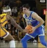 ?? ROSS D. FRANKLIN / AP PHOTO ?? Lazar Stefanovic helped UCLA rally to beat Arizona State late on Wednesday night in Tempe.
