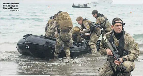  ?? Picture / NZDF ?? Soldiers rehearse boat landings in Akaroa Harbour.