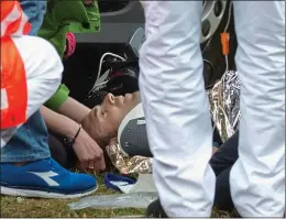  ??  ?? SICKENING: Alejandro Valverde receiving treatment after his crash