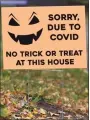  ?? H John Voorhees III / Hearst CT Media ?? Some residents have placed signs in their yards to discourage trick-or-treating this Halloween.