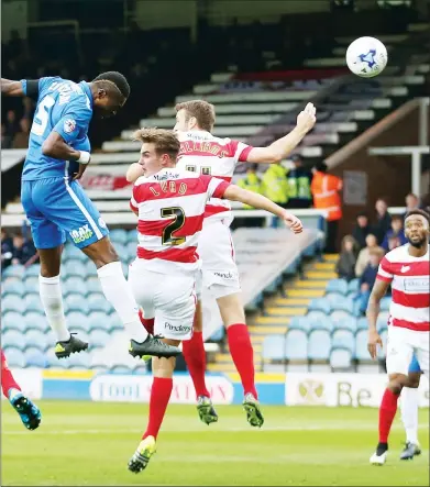  ??  ?? ZAK ATTACK: Peterborou­gh defender Gabriel Zakuani scores from a corner to make it 1-0