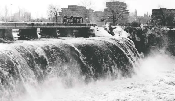  ?? CITY OF OTTAWA ARCHIVES ?? A photo of the Rideau Falls taken in March 1974 during an investigat­ion into the drownings of three City of Vanier workers during ice-blasting operations on the Rideau River on the night of March 7, 1974. The workers who died included Rémi Hotte, 42, Sylvio Desjardins, 51, and Gaston Joly, 20. Thomas Allain, 33, and Bernard Beaudry, 37, survived.