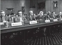  ?? PABLO MARTINEZ MONSIVAIS/AP ?? CEOs from pharmaceut­ical companies AbbVie, from left, AstraZenec­a,Bristol Myers Squibb, Johnson &amp; Johnson, Merck &amp; Co., Pfizer andSanofi wait Tuesday to testify before the Senate Finance Committee hearing.