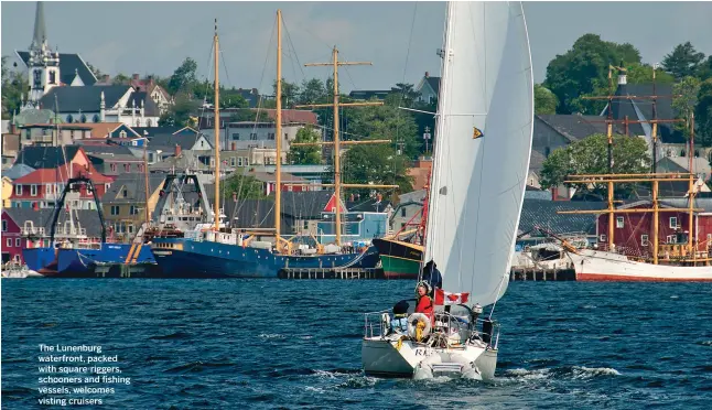  ??  ?? The Lunenburg waterfront, packed with square-riggers, schooners and fishing vessels, welcomes visting cruisers