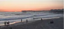  ?? DAWN GILBERTSON/USA TODAY NETWORK ?? In general, beaches such as Pacific Beach in San Diego, with Crystal Pier as a backdrop, remain open.