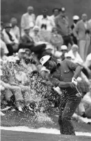  ??  ?? Lee Elder hits the ball from a sand trap on the 18th hole at the 1975 Masters in Augusta. Photograph: AP