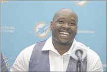  ?? LAYNN SLADKY / ASSOCIATED PRESS ?? After a controvers­ial NFL draft, former Ole Miss tackle and top Dolphins pick Laremy Tunsil wasn’t talking about the past at his news conference Friday. “I’m just here to talk about the Miami Dolphins,” Tunsil said repeatedly.