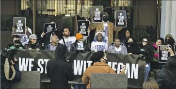  ?? Jason Armond Los Angeles Times ?? SUPPORTERS of rapper Megan Thee Stallion gather Dec. 13 outside a Los Angeles court. On Friday, jurors found Tory Lanez guilty of shooting her in the feet during a 2020 argument in Hollywood.