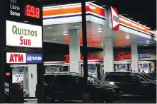  ?? SEAN KILPATRICK, THE CANADIAN PRESS ?? A Pioneer gas station is shown in Carleton Place, Ont. Parkland Corp. is looking to sell 157 convenienc­e store and fuel station locations across in six provinces.