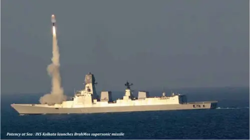 ??  ?? Potency at Sea : INS Kolkata launches BrahMos supersonic missile
