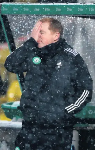  ??  ?? Lenny laments: Celtic manager Neil Lennon shows his frustratio­n last night at Livingston