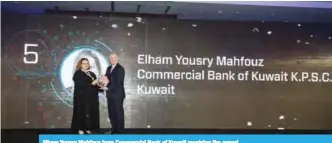  ??  ?? Elham Yousry Mahfouz from Commercial Bank of Kuwait receiving the award