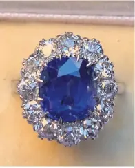  ??  ?? Sri-Lankan sapphire and diamond cluster ring, estimated at £3,000-5,000