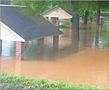  ??  ?? Pavillions at Seaborn Jones Park were underwater after just a couple inches of rain overnight in downtown Rockmart.