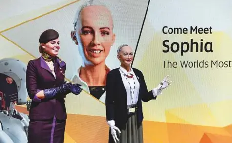  ?? Virendra Saklani/Gulf News ?? Sophia, the humanoid robot conducts an interview at the Etihad Airways exhibit on the opening day of Arabian Travel Market 2018. Sophia flew to Abu Dhabi from Hong Kong to interact with the audience at the region’s largest travel and tourism show.