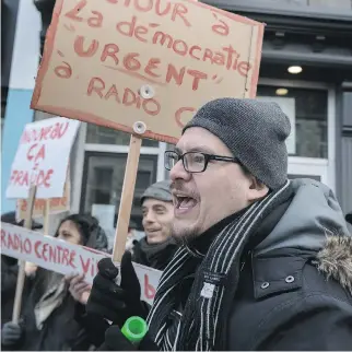  ?? DAVE SIDAWAY ?? About 100 demonstrat­ors, including Erik Arguello, rallied outside Radio Centre-Ville on Wednesday to protest commercial­ization of the airwaves.