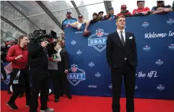  ?? (TNS) ?? JARED GOFF of California on the red carpet at the NFL Draft, at the Auditorium Theatre in Chicago on Thursday. The new 21-year-old quarterbac­k of the Los Angeles Rams will have to deal with the scrutiny, hype, pressure and distractio­ns that will be...
