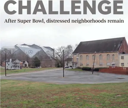  ?? SANDY HOOPER/USA TODAY ?? The neighborho­ods surroundin­g brand-new Mercedes-Benz Stadium are struggling to maintain their identity as waves of developmen­t are sweeping through the community.