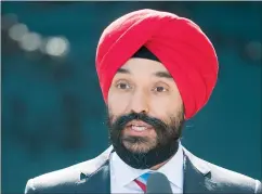  ?? CP PHOTO GRAHAM HUGHES ?? Minister of Innovation, Science and Industry Navdeep Bains speaks during a news conference in Montreal on Aug 31.