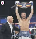  ??  ?? Taylor celebrates with manager Barry Mcguigan, left, after defeating Dave Ryan at Meadowbank in 2016 to win the Commonweal­th title.
The Prestonpan­s man roars with delight after last November’s victory over Ryan Martin at the SSE Hydro in Glasgow.
Landing the punch that sent American fighter Martin to the canvas in the seventh round.