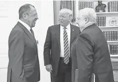  ?? RUSSIAN FOREIGN MINISTRY VIA AP ?? President Trump, Russian Foreign Minister Sergey Lavrov, left, and Russian Ambassador Sergey Kislyak last week.