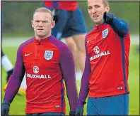  ??  ?? CAPTAINS UNITED: Wayne Rooney and Harry Kane
