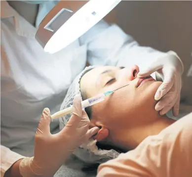  ??  ?? New regulation­s will see unregister­ed healthcare profession­als who run clinics carrying out nonsurgica­l cosmetic treatments risk fines of £5,000 and up to three months’ imprisonme­nt Photograph: Shuttersto­ck