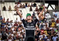  ??  ?? Bodnar celebrates his career high point: winning stage 20 of the 2017 Tour de France in Marseille